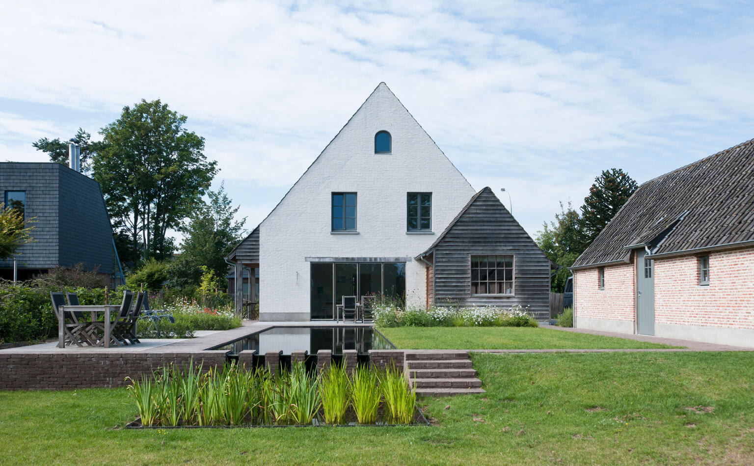 Greenarchitects stefaan willems tuinarchitect laarne Hoogteverschil in ecologische tuin